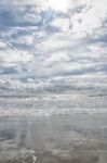 Sky Reflected In The Sand Stock Photo