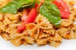 Italian Pasta Farfalle Butterfly Bow-tie And Tomato Sauce Stock Photo