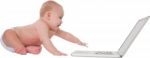 Cute Baby Boy Using Laptop Computer Stock Photo