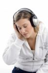 Woman Listening To Music With Closed Eyes Stock Photo