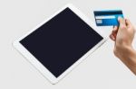 Tablet Pc With A Credit Card Stock Photo