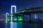 Tokyo Skyline With Rainbow Bridge And Tokyo Tower. Tokyo, Japan Stock Photo