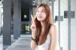 Portrait Of Thai Adult Beautiful Girl Read And Think In University Stock Photo