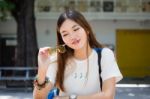 Portrait Of Thai Chinese Adult Glasses Beautiful Girl Denim Blue Bag Relax And Smile Stock Photo