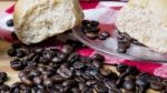 Coffee And Bread Wooden Background Stock Photo