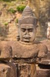 Statue Of Ancient Khmer Warrior Head At Angkor Wat Stock Photo