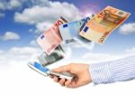 Mobile Phone And Euro Money Stock Photo