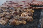 Traditional Meat Grilled On The Grill In The Argentine Countryside Stock Photo