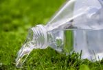 Pouring Water From Bottle Stock Photo