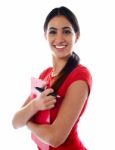 Smiling Girl Holding Clipboard Stock Photo