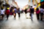 Blurred People Walking On The Street Stock Photo