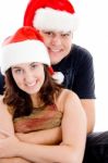 Couple Wearing Christmas Hat Stock Photo