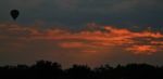 Hot Air Balloon In A Sunset Stock Photo