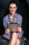 Sexy Woman Browsing On Touch Pad Device Stock Photo