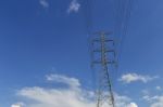 High Voltage Electric Pole With Space On Sky Stock Photo