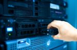 Man Fix Server Network In Data Center Room Stock Photo