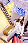 Beautiful Young Woman Holding Shopping Bags Stock Photo