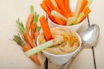 Fresh Hummus Dip With Raw Carrot And Celery Stock Photo