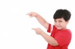 Boy Points At Something Stock Photo