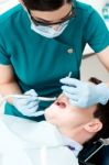 Dentist Examines A Patient Stock Photo