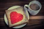 Delicious Slice Of Bread With Strawberry Jam Heart Shape Stock Photo