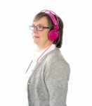 Aged Woman Wearing Headphone Stock Photo