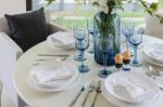 Dinning Room With White Round Table At Home Stock Photo