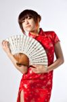 Chinese Model In Traditional Cheongsam Dress Stock Photo