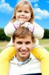 Smiling Father And Daughter Stock Photo