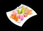 Mixed Sashimi In White Plate Isolated On Black Background,with C Stock Photo