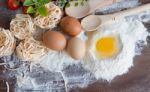 Ingredients Preparation Spaghetti With Eggs, Tomatoes Herbs And Spices Stock Photo