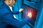 Man Fix Server Network In Data Center Room Stock Photo