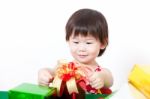 Happy Little Girl With Gift Box Stock Photo