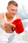 Male Showing Coffee Mug Stock Photo