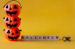 Halloween Jack O Lantern Bucket With Halloween Word On Yellow Ba Stock Photo