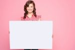 Teenage Girl Holding Blank Notice Stock Photo