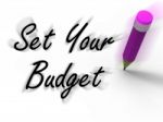 Set Your Budget With Pencil Displays Writing Financial Goals Stock Photo