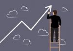 Business Man Standing On Ladder Drawing Growth Chart Stock Photo