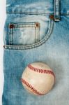 Old Baseball On Jean Stock Photo