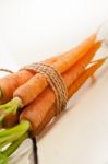 Baby Carrots Bunch Tied With Rope Stock Photo