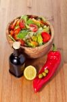 Wooden Bowl With Salad Stock Photo