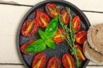 Baked Cherry Tomatoes With Basil And Thyme Stock Photo