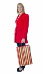 Senior Lady Holding Shopping Bag Stock Photo