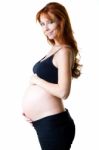 Beautiful Pregnant Woman Relaxing At Home Stock Photo