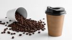 Paper Coffee Cup With Coffee Beans Stock Photo