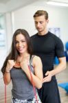 Workout With Couch At Fitness Club Stock Photo