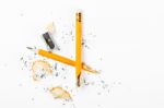 Broken Pencil With Metal Sharpener And Shavings Stock Photo