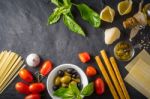 Italian Food Still Life On The Dark Table Top View Stock Photo