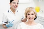 Woman Ready For A Dental Exam Stock Photo