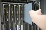 Man Fix Server Network In Data Center Room Stock Photo